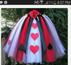 a dress made out of tulle with hearts on it