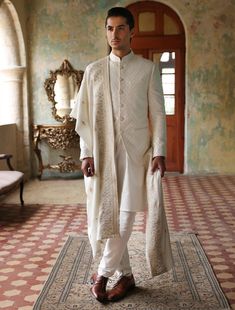 Off-white embroidered fabric prince coat with kurta pajama. Elevate your attire with a custom Nehru jacket, perfect for cultural events, festivals, and parties. Complete your groomsmen's attire with a Nehru jacket and sherwani ensemble.In the world of men's formal wear, the off-white prince coat emerges as a beacon of refined elegance, crafted meticulously from a blend of luxurious cotton fabrics. Its pristine hue, reminiscent of purity and sophistication, sets the stage for a distinguished aest Prince Coat, Geometric Diamond Pattern, Indian Party Wear, Mens Formal Wear, Kurta Pajama, Nehru Jackets, Mens Formal, Sister Wedding, Embroidered Fabric