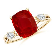 a red ring with two white diamonds on the sides and an oval shaped stone in the middle