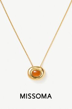 Discover layering necklaces in silver or gold. Make it molten with show-stopping sculptural shaped pendants, from the nugget and doughnut, to the bean. Our best selling styles pair molten metals with hand-cut semi-precious gemstones. The Nugget