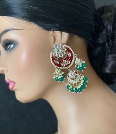 Make your self look pretty in these trendy Meenakari kundan chandbali  pearl jhumkas! The weight of the earrings is 1.6 oz. Product care: Avoid contact with Chemicals such as Perfumes or any Sprays. Prevent the Jewellery from the water. Use Butter Paper or Cotton Cloth to store your Jewelry for a longer Product life. Pearl Jhumkas, Kundan Chandbali, Butter Paper, Earrings Trendy, How To Look Pretty, Chemicals, Jewelry Earrings Dangle, Dangle Drop Earrings, Pearl Earrings