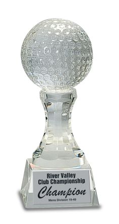 a clear glass trophy with the words river valley club championship on it's base