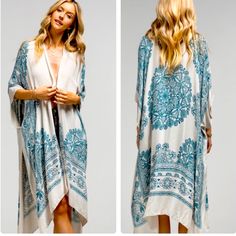 Semi-Sheer Woven Kimono Features An Ornate Mandala Print With Lotus Pattern Border Teal And White. *100% Viscose *Approx. W 40" L 36" Casual Summer Vacation Trendy Birthday Christmas Cruise Party Office Shower '90s Gift Spring Lounge White Boho Print Kimono For Beach Cover-up, White V-neck Kimono For Day Out, White Boho Print Kimono For Summer, Casual White Floral Print Cover-up, Casual Printed White Kimono, Casual White Printed Kimono, White Kimono With Boho Print, White Kimono For Brunch In Summer, White V-neck Summer Kimono