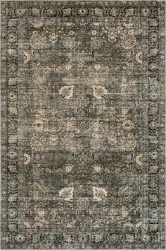 an area rug with various colors and patterns on the carpet, including greys, beiges, and browns