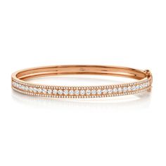 1.70CT 14K GOLD DIAMOND BANGLE Metal Type: 14K GoldMetal Weight: 14.20 GramsSide Stone Shape: Round DiamondsSide Stone Weight: 1.70 Ct. DiamondsDimensions: 0.20" Width / 0.00" Height / 0.00" LengthOther Information: 0.20"W Size Small Luxury Round Wedding Bangle, Rose Gold Diamond Bangle With Pave Setting, Rose Gold Bangle With Pave Setting, Diamond Bangle In Rose Gold With Pave Setting, Rose Gold Diamond Bracelet With Pave Setting For Wedding, Rose Gold Pave Diamond Bracelet For Wedding, Classic Rose Gold Bangle With Single Cut Diamonds, Rose Gold Bracelet With Brilliant Cut For Wedding, Rose Gold Brilliant Cut Bangle For Weddings