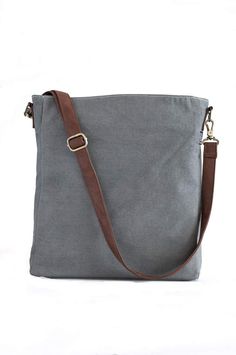 PRICES MAY VARY. A slightly smaller but just as mighty version of the maika Recycled Canvas Crossbody Bag in easygoing recycled canvas (8.5” x 11” x 3”) Features a zippered top, an interior zip pocket, an easy-to-clean waterproof lining and a vegan leather strap and hook for clipping on keys or a maika Recycled Canvas Travel Pouch Vegan leather detachable strap can be adjusted up to 44” Use a damp soft cloth to spot clean canvas exterior as needed; gently wipe down vegan leather handles and trim Cheap Casual Canvas Mobile Phone Bag, Cheap Modern Crossbody Box Bag, Affordable Casual Canvas Laptop Bag, Cheap Flap Bag With Adjustable Handle For Travel, Cheap Crossbody Box Bag, Cheap Trendy Canvas Bag With Zipper Closure, Cheap Travel Crossbody Box Bag, Cheap Everyday Bags With Laptop Sleeve, Cheap Shoulder Bag With Removable Pouch For Daily Life