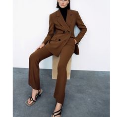 High-Waist Trousers With Front Pockets And False Rear Welt Pockets. Flared Both. Front Fastening With Metal Hook, Inside Button And Zip Fly. Fitted Fall Suit Trousers, Chic Fall Suits With Trousers, Fitted Trendy Pantsuit For Fall, Office Pantsuit With Trousers For Fall, Fall Office Pantsuit, Fitted Single Breasted Bottoms For Workwear, Fall Season Office Pantsuit, Chic Tailored Single-breasted Bottoms, Fitted Single-breasted Wide Leg Pantsuit