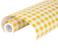 a roll of yellow and white checkered paper