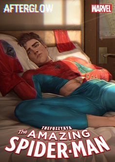 a man laying on top of a bed next to a spider - man movie poster