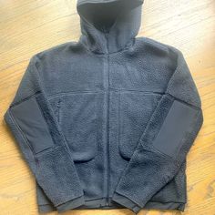 Never Worn. Super Cozy Fleece-lined Outerwear For Streetwear, Cozy Fleece Jacket For Winter Streetwear, Solid Fleece Outerwear For Streetwear, Winter Fleece Hooded Jacket With Pockets, Blue Winter Techwear Outerwear, Sporty Solid Fleece Jacket For Winter, Sporty Solid Color Fleece Jacket For Winter, Blue Techwear Winter Outerwear, Sporty Winter Fleece Jacket