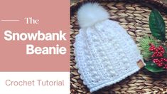 the snowbank beanie crochet pattern is shown on a basket with berries