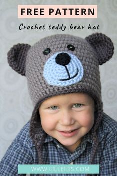 a young boy wearing a crocheted bear hat