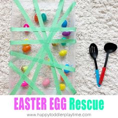 an easter egg rescue craft with eggs, spoons and candy on the ground next to it