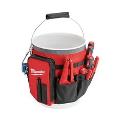 a red and black bucket with tools in it on a white background, showing the contents inside