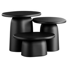 three black tables sitting next to each other