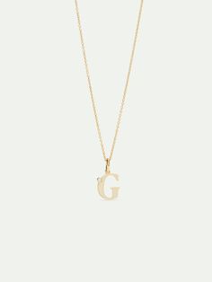 On this pendant necklace, the enameled letter G appears, colored an off-white and adorned with cubic zirconia. Les Néréides reinvents the alphabet. This time, after the Floral Letters and Extraordinary Alphabet collections, the choice was made for an elegant and timeless typography. The enameled letters are available in four complementary colors (off-white, pastel pink, cornflower blue and burgundy red) and embellished with cubic zirconia. Pendant Necklace: Gold-plated brass, hand-enameled and cut glass Length: 42cmWidth: 2cmDepth: 0.53cmWeight: 2.26g AMSO210/1 AMSO210/1 Pink Cornflower, Timeless Typography, Paris Souvenirs, Blue And Burgundy, White Pastel, Les Nereides, Letter G, Floral Letters, Love Charms