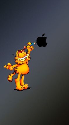 an apple logo with a cartoon cat blowing on it