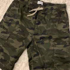 Big Boys Camo Shorts With Pockets. New. Never Worn!! I Couldn’t Get Him To Wear Them. He’s A Very Picky Boy. Size: 14/16 Casual Camouflage Cotton Shorts, Casual Green Shorts For School, Casual Green School Shorts, Casual Green Bottoms For School, Casual Green School Bottoms, Military Style Camouflage Shorts With Multiple Pockets, Military Style Camouflage Shorts With Side Pockets, Military Style Camouflage Cargo Shorts With Side Pockets, Military Camouflage Shorts With Multiple Pockets