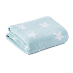 a blue blanket with white stars on it