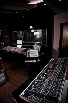 a recording studio with many equipment in it