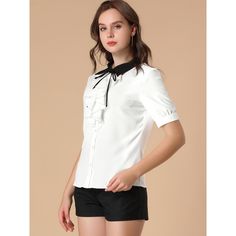 A lightweight polyester shirt with a partially ruffled front closure adds sleek interest to the look. These charming Victorian short-sleeved tee-shirt sleeves ruffle front tops bring you a comfortable feeling. The ruffle detail design, makes you look slimming fit. A casual elegant style shirt perfectly pairs with jeans or skirts for an office look for work. Casual Elegant Style, Ruffle Fabric, Polyester Shirt, Chiffon Long Sleeve, Contrast Collar, Work Shirt, Work Tops, Work Looks, Women's Shirts