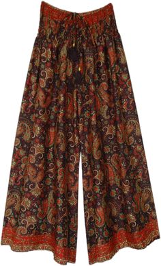 Floral and paisley prints on wide-leg pants which are soft and flowy, and have a smocked waist.  The loose-fit wide-leg printed rayon pants have a comfortable waist that will fit a small to a large. #tlb #SplitSkirtsPants #beachwrap #Printed #bohemianfashion #festivalpants Hippie Flower Pants, Casual Wide Leg Pants With Boho Print, Bohemian Wide-leg Pants With Paisley Print, Bohemian Wide-leg Paisley Print Pants, Bohemian Wide-leg Paisley Pants, Bohemian Wide Leg Bottoms With Paisley Print, Casual Paisley Print Bottoms For Fall, Casual Paisley Print Pants For Fall, Bohemian Wide Leg Ankle-length Pants For Fall