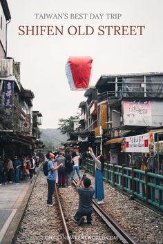 This guide will provide you with everything you need to know on visiting Shifen old street, including how to get there, day trip recommendations, and other nearby places of interest. We thoroughly enjoyed our trip there, and we think you will too!  . .  taiwan travel tips | taiwan best places to visit | taiwan where to stay | taipei things to do | best places taipei | taiwan culture | taiwan aesthetic | travel aesthetic Shifen Taiwan, Taiwan Street, Wedding Dress Code, Full Time Travel, International Travel Tips