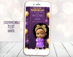 an iphone with the text, customizable text in purple and gold on it