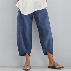 Season:Summer; Fabric:Polyester,Linen / Cotton Blend; Look After Me:Hand wash,Machine wash; Gender:Women's; Size Suggestion:select one size larger than usual; Style:Chino,Sporty; Elasticity:Micro-elastic; Occasion:Casual,Daily,Vacation; Fit Type:Regular Fit; Waistline:Natural; Pattern:Solid Color; Design:Pocket; Special Size:Plus Size; Pants Type:Capri shorts,Chinos; Front page:FF; Listing Date:07/28/2021; Hips:; Length:; Waist:; Special selected products:PlusSize,COD; Pants Length:Calf-Length Casual Washed Solid Bottoms, Summer Cotton Solid Color Capris, Summer Solid Color Cotton Capris, Baggy Cotton Capris Casual Style, Relaxed Fit Washed Bottoms, Baggy Wide Leg Casual Capris, Capri Shorts, Cheap Pants, Shorts Plus Size