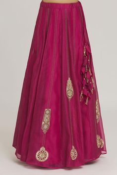 Rani pink can can attached lehenga with bead embroidered filigree motifs embellished by pearls. Comes with embroidered padded blouse and dupatta.
Components: 3
Pattern: Embroidered
Type Of Work: Zardozi, Bead, Pearl
Neckline: Round
Sleeve Type: Half
Fabric: Pure Organza,Pure Self Golden Striped Silk Chanderi
Color: Pink
Other Details: 
Closure:
Blouse: Back hook
Lehenga: Side drawstring
Lehenga Length: 42 Inches
Occasion: Sangeet,Wedding - Aza Fashions Rani Pink, Padded Blouse, Filigree Pattern, Stripe Silk, Set For Women, Aza Fashion, Sleeve Type, Lehenga, Types Of Sleeves