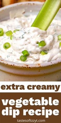 a bowl full of dip with celery sticks sticking out of it and text overlay that reads extra creamy vegetable dip recipe