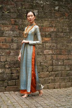 Discover the allure of our Vietnamese dress ao dai modern, enhancing your grace and elegance. #aodai #modernaodai #linen #linenclothing #linenclothes #traditionalaodai #linenaodai #linencollection #aodailinen #innovativeproducts #aodaivietnam #vietnamaodai #aodaiwedding Luxury Long Sleeve Ao Dai For Festive Season, Luxury Fitted Long Sleeve Ao Dai, Luxury Ao Dai For Summer Wedding, Luxury Traditional Long Sleeve Ao Dai, Luxury Ao Dai With Mandarin Collar For Formal Occasions, Luxury Traditional Ao Dai For Evening, Elegant Luxury Ao Dai For Formal Events, Luxury Formal Festive Ao Dai, Luxury Long-sleeve Ao Dai For Formal Occasions