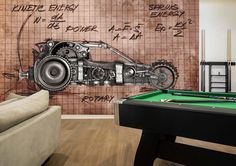 a living room with a pool table, couch and wallpaper that has an image of a motorcycle on it