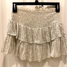 **New** Sequin Layered Skort Zipper Closure Size S Cream/Silver/Gold Shimmer. Perfect For Special Occasions And Holidays. Cream Sparkly Skirt, Fitted Silver Skirt For Summer, Summer Silver Sequined Mini Skirt, Glamorous Silver Mini Skirt For Summer, Glamorous Silver Summer Skirt, Silver Mini Skirt For Summer Nights, Silver Mini Skirt For Summer Night Out, Glamorous Silver Mini Skirt For Spring, Glamorous Silver Skirt For Spring