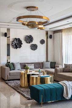 a living room filled with lots of furniture next to a large window covered in curtains