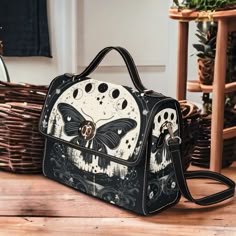 "Cottagecore Moth and Moon Phases Canvas Satchel Bag, Witch Moon Phases Crossed body vegan leather strap hand bag, goth bag hippies boho gift  >>PRODUCT INFO<< * 18.94 Oz. Made from high-grade waterproof canvas, durable, water-resistant. * Can be used as a nice laptop storage bag, business briefcase, college school bag, leisure travel tote bag, crossbody messenger bag, card wallet case, etc. * Two interior pockets for small items one zipper pocket. * Removable and adjustable shoulder strap. * Th Vintage Black Shoulder Bag For Festival, Handbag Design Ideas, Witch Moon Phases, Witchy Purse, Witch Bag, Goth Bag, School Satchel, Gothic Bag, Witch Moon