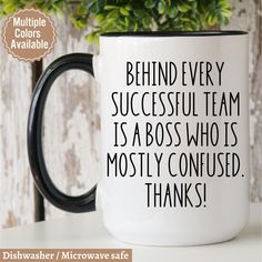 a black and white coffee mug with the words, behind every successful team is a boss who's mostly confused thanks