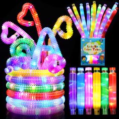 glow in the dark bracelets and pens are on display with an assortment of colors