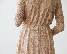 "Stunning. trending and lightweight short lace dress. Lace bodice and long sleeves, at knee length. This is the perfect lace dress for any special occasion or party or for stylish bridesmaids on a summer wedding! The dress has a modest yet vintage style, knee-length hemline, delicate v-neck, and is carefully crafted using the finest soft lace. A refined and classic fit designed for style, comfort, and form. The lace dress is graceful and a timeless gown. ♥ Wrap top with V-neckline ♥ Long lace sl Spring Dresses With Delicate Lace And Long Sleeves, Long Sleeve Lace Trim Dress For Wedding Guest, Long Sleeve Dress With Lace Trim For Wedding Guest, Lace Wedding Dresses For Fall, Elegant Lace Wedding Dress For Fall, Spring Bridesmaid Lace Dress With Lace Back, Long Sleeve Dress With Lace Sleeves For Wedding Guest, Long Sleeve Lace Dress With Lace Back For Party, Long Sleeve Bridesmaid Dress With Lace Patchwork