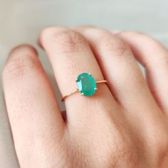 This stunning ring is set in 14k Solid Yellow Gold with Natural Emerald with utmost precision. It is an unique dainty gemstone ring for nearly every occasion and is completely hassle-free jewelry. 🔷GEMSTONE:  Emerald is often associated with love and romantic relationships. It is believed to promote love, loyalty, and unity, making it a popular choice for engagement and anniversary jewelry. Emerald is often associated with abundance and financial success. It is believed to attract prosperity an Emerald Oval Cabochon Ring As A Gift, Oval 14k Gold Gemstones For Gift, Oval 14k Gold Gemstones As Gift, Oval Emerald Gemstone Ring Fine Jewelry, Oval Emerald Ring As A Gift, 14k Gold Oval Cabochon Emerald Ring Gift, Oval Emerald Ring For Gift, Yellow Gold Emerald Ring, Oval Cabochon Gift, Oval Gemstones With Prong Setting For Gift