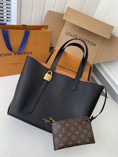 Embrace elegance with this Louis Vuitton Low Key Cabas MM-inspired tote bag in a timeless black hue. Crafted from supple grained calfskin leather, this spacious bag is perfect for everyday use. The subtle embossed logo and iconic padlock add signature Louis Vuitton touches, while the adjustable handles offer versatile carrying options. This classic and practical accessory complements any style. 30*14*47 CM Disclaimer: This product is inspired by the Louis Vuitton design and is not an official Lo Louis Vuitton Classic Bags, Louis Vuitton Mm, Fall Winter Jacket, Buy Louis Vuitton, Classic Bags, Bottega Veneta Shoulder Bag, Hanging Bag, Leather Bags, Embossed Logo