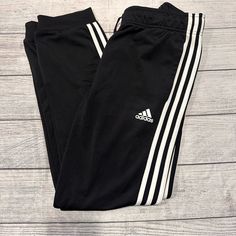 Women’s Adidas Jogger Style Sweatpants Size M Color Black Euc (Washed But Never Worn) Fabric: 100% Polyster Women’s Sweatpants Adidas, Adidas Stretch Sportswear Pants, Adidas Stretch Pants With Three Stripes, Adidas Sportswear Pants For Loungewear, Adidas Fitted Sweatpants, Adidas Three Stripes Pants For Loungewear, Adidas Three Stripes Loungewear Pants, Adidas Loungewear Pants With Three Stripes, Black Adidas Activewear For Loungewear