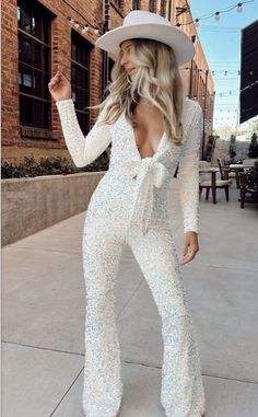 Disco Wedding Jumpsuit, White Outfits Birthday, Sparkle Jumpsuit Wedding, White Party Ideas Outfits, Bedazzled White Cowgirl Boots, Shiny Bachelorette Outfit, White Reception Jumpsuit, Brides Rehearsal Dinner Outfit, Sparkly Jumpsuit Wedding