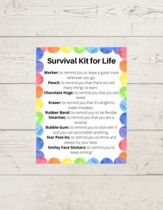 the survival kit for life is displayed on a white wooden background with colorful polka dots