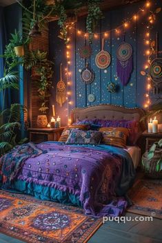 a bedroom decorated in purple and blue with lights on the headboard, rugs and bedding