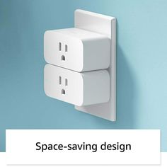 two white electrical outlets on a blue wall with the words space saving design above them