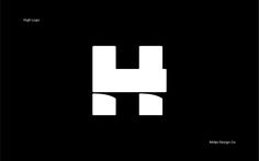 a black and white logo with the letter h in it's center, on a dark background