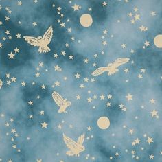 a blue background with white stars and doves