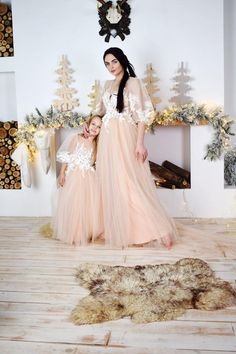 Very beautiful beige mother daughter matching lace maxi dresses for unforgettable moments!We are glad to welcome you in our atelier! We offer a complete set of matching dresses for a mother and daughter. All of the dresses in our shop are made based on your individual measurements. It is personally sewn by our seamstress on professional and modern equipment. We guarantee very high quality of sewing. We take into account all of your wishes when we craft our designs. They will fit and look much be Lace Maxi Dresses, Most Expensive Dress, Daughter Dress, Mother Daughter Dresses Matching, First Birthday Dresses, Mother Daughter Dress, Dress Photo, Beige Dress, Dress Beige