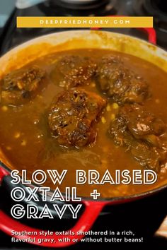 slow braised oxtail and gravy in a red pot on the stove